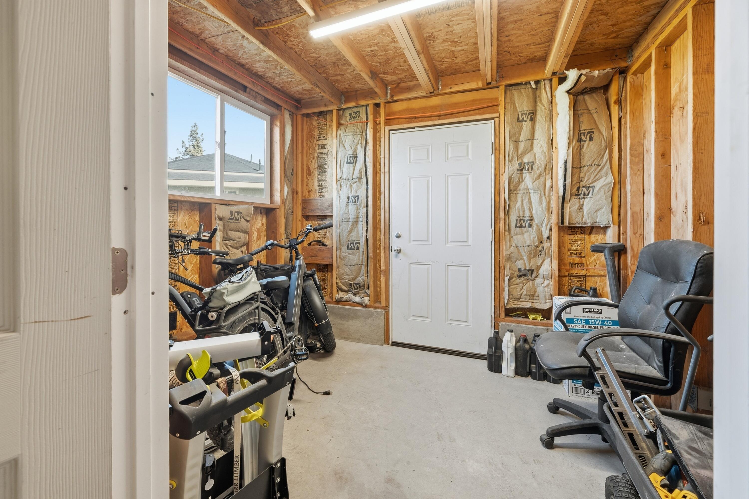 4074 Southwest Reif Road Powell Butte, OR 97753 - Photo 40 of 59 a view of a room with gym equipment