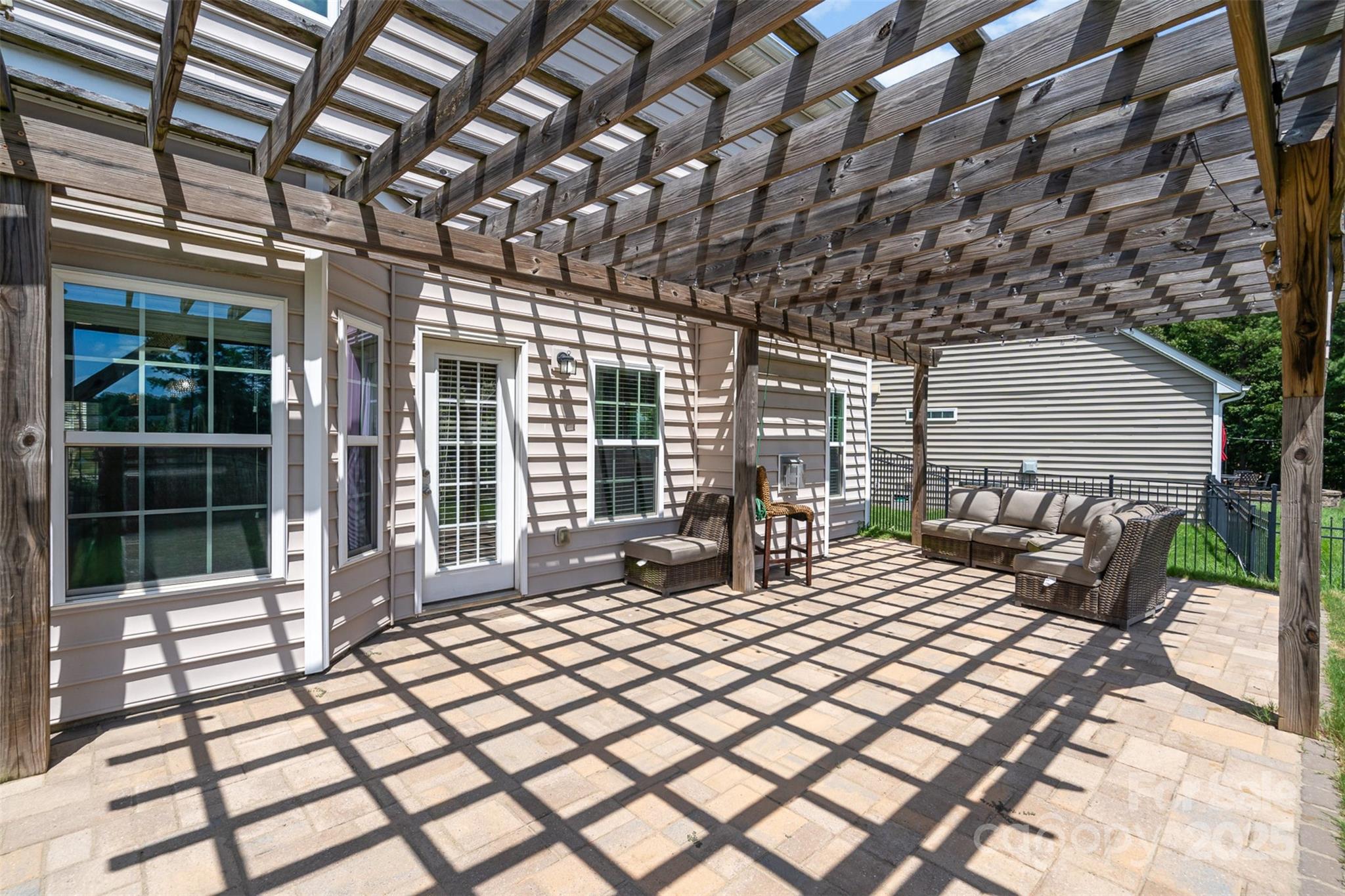 8931 Happiness Road Harrisburg, NC 28075 - Photo 23 of 32 a balcony with chairs and table