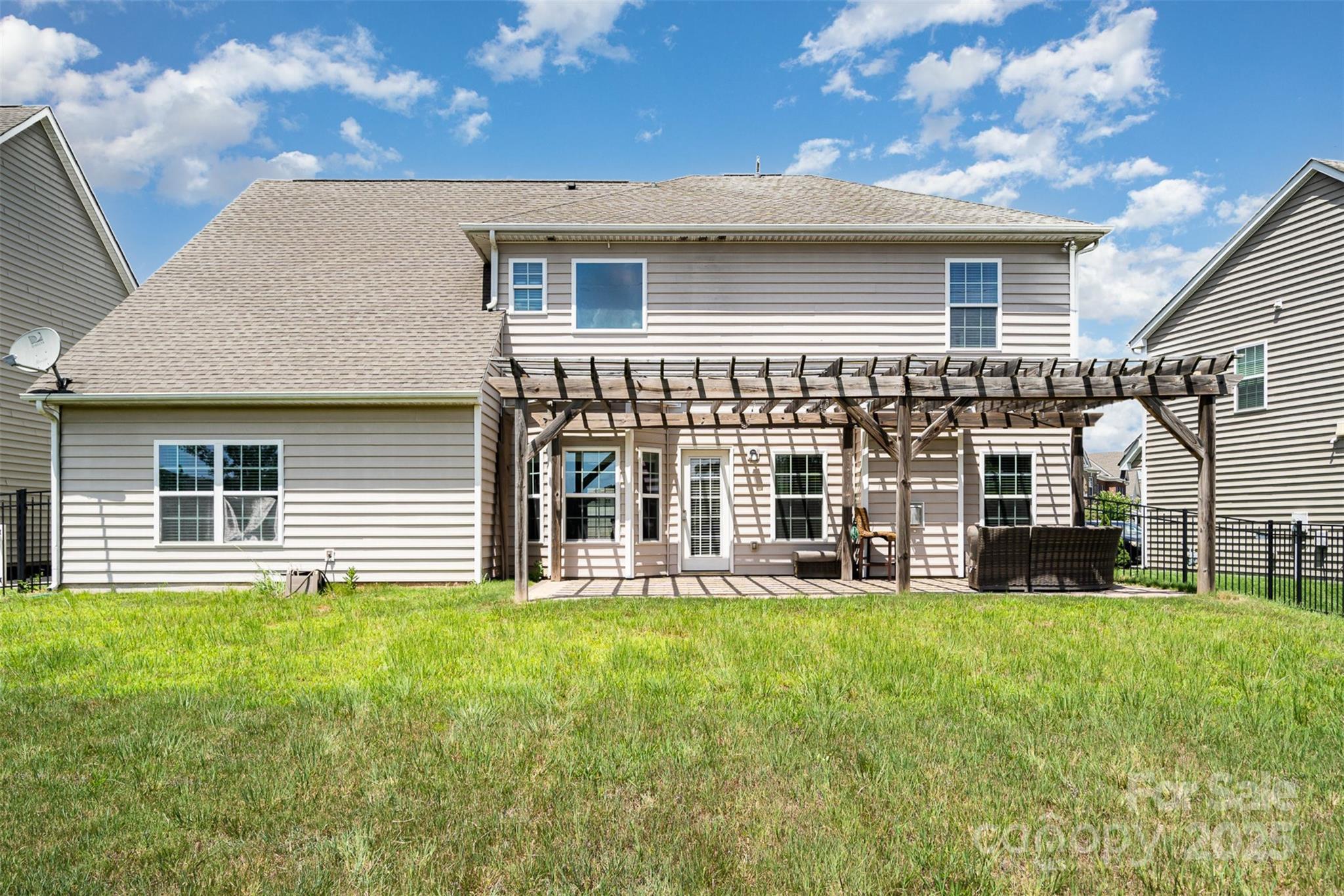 8931 Happiness Road Harrisburg, NC 28075 - Photo 24 of 32 front view of a house with a yard