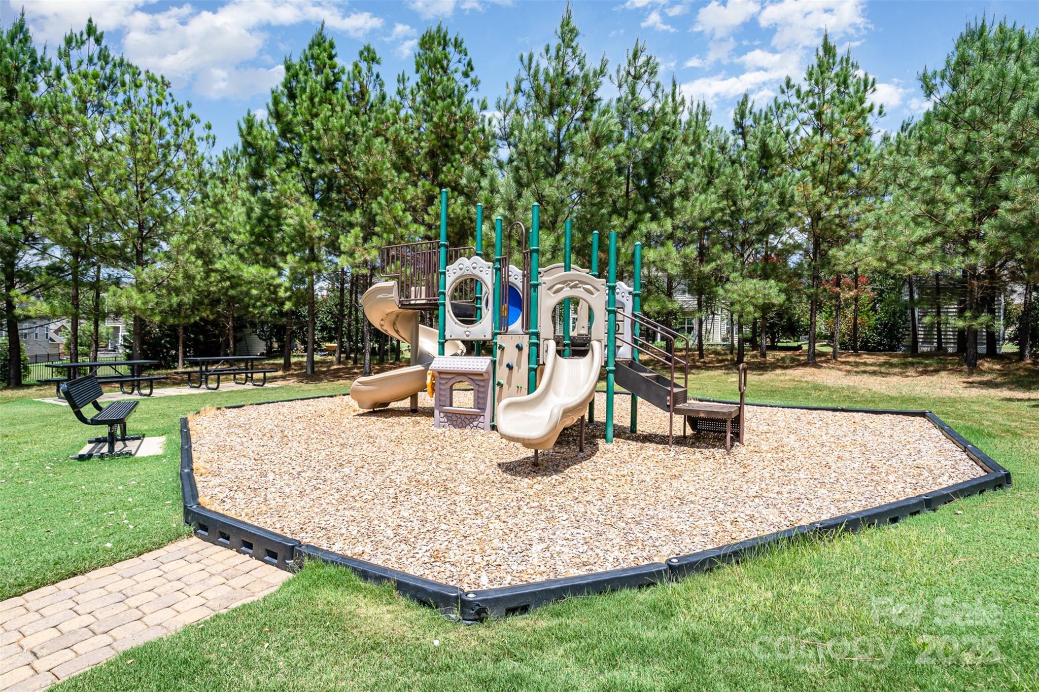 8931 Happiness Road Harrisburg, NC 28075 - Photo 28 of 32 a park view with a sitting space