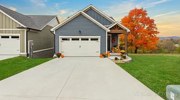 a view of a house with backyard