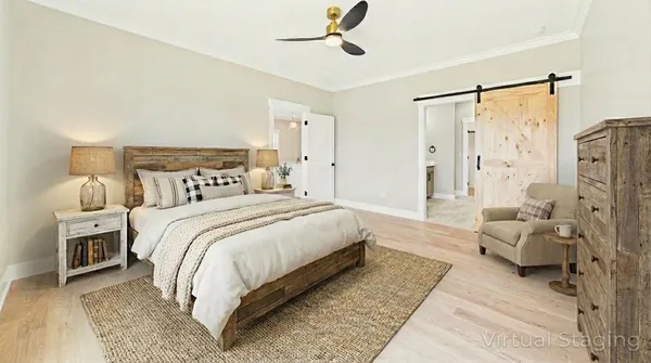 a bedroom with a bed and a couch