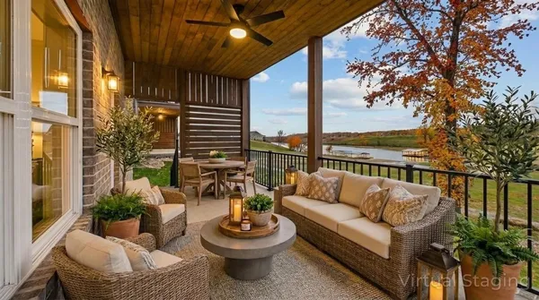 a view of a patio with couches and potted plants