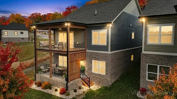 an aerial view of a house with a garden