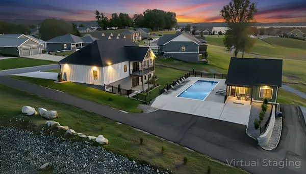 a view of house with yard outdoor seating and city view