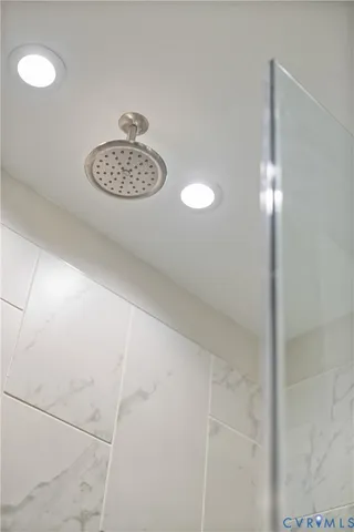 a view of a hallway with a chandelier