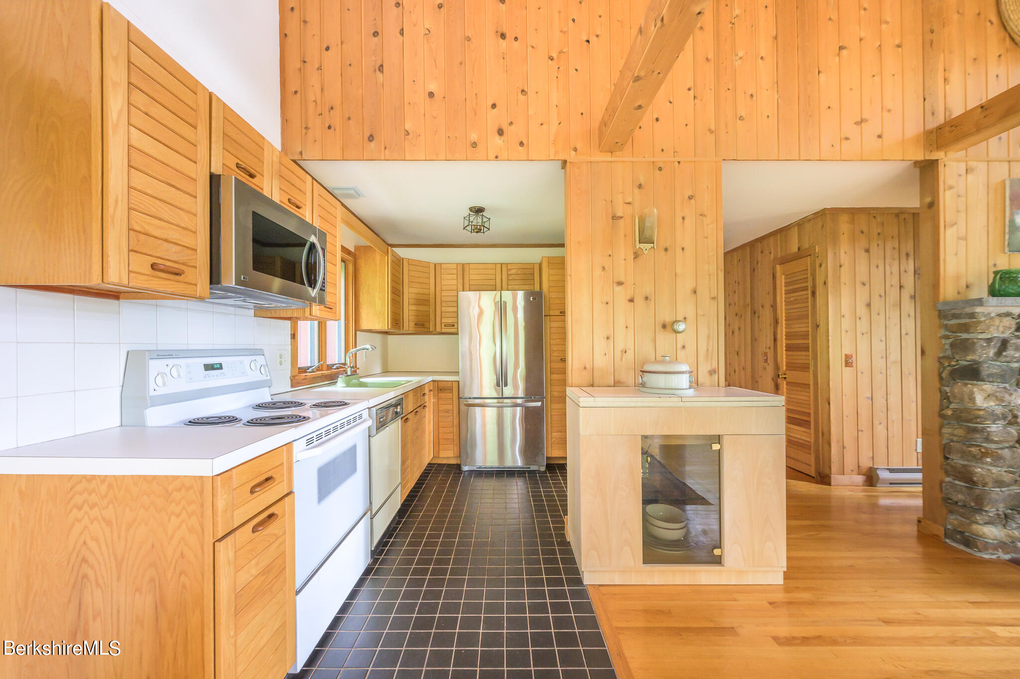 29 Lakeside Drive Tyringham, MA 01238 - Photo 13 of 31 a kitchen with stainless steel appliances a stove a sink and a refrigerator