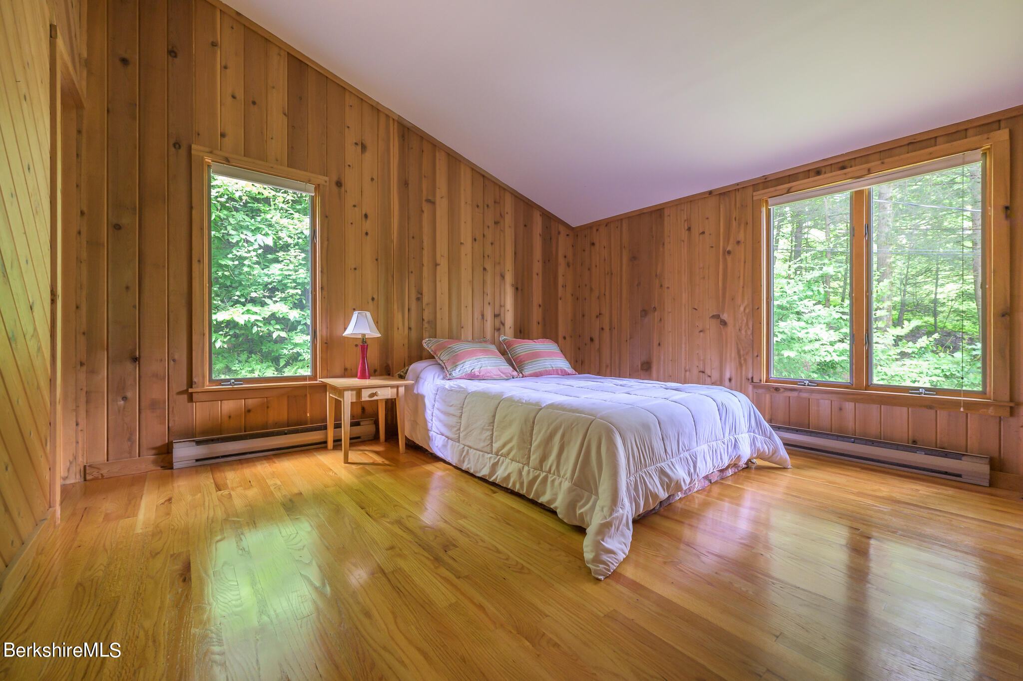 29 Lakeside Drive Tyringham, MA 01238 - Photo 15 of 31 a bedroom with a bed and a window