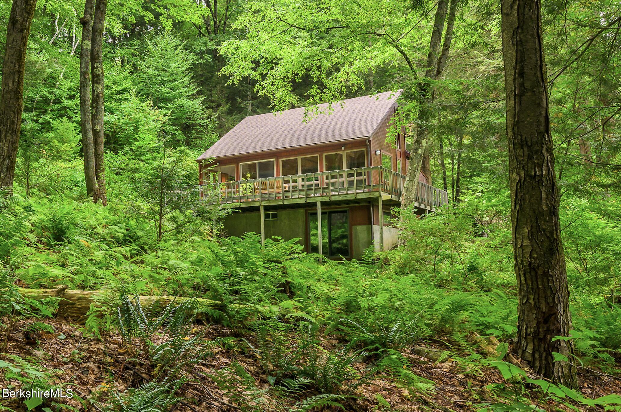 29 Lakeside Drive Tyringham, MA 01238 - Photo 20 of 31 front view of a house with a yard