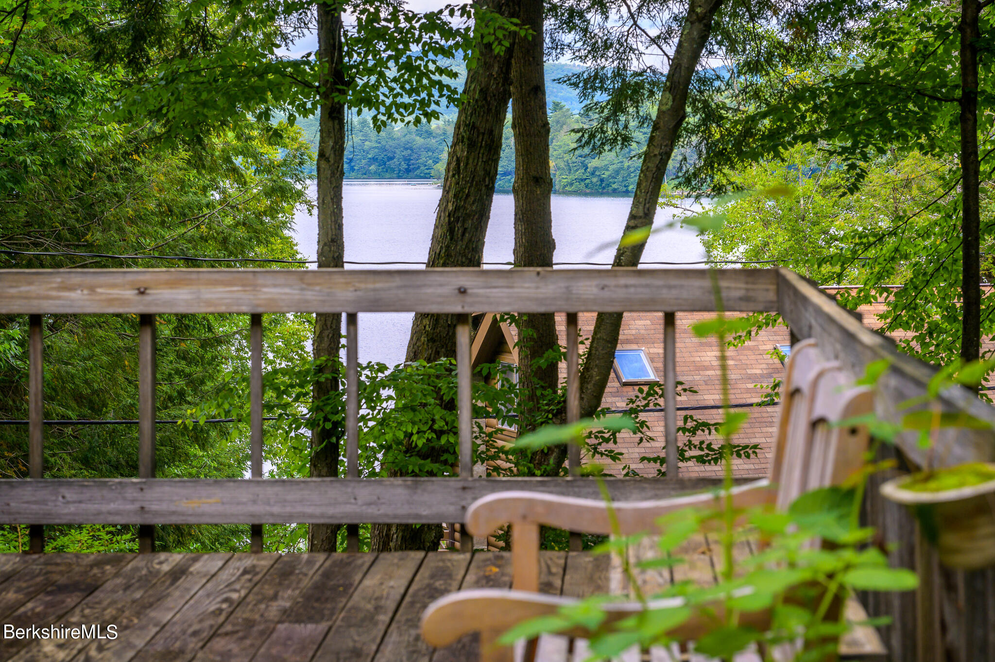 29 Lakeside Drive Tyringham, MA 01238 - Photo 2 of 31 a view of swimming pool with lawn chairs and wooden fence