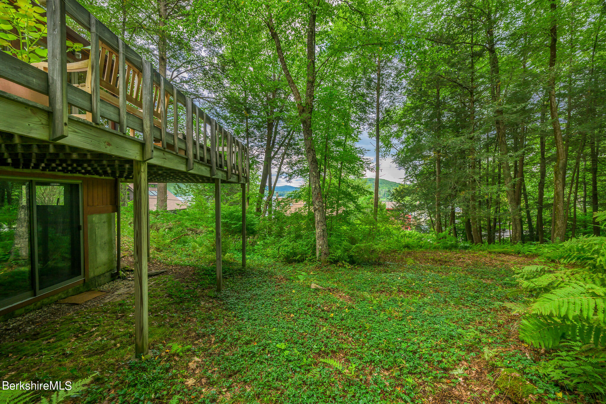 29 Lakeside Drive Tyringham, MA 01238 - Photo 24 of 31 a view of a house with a backyard