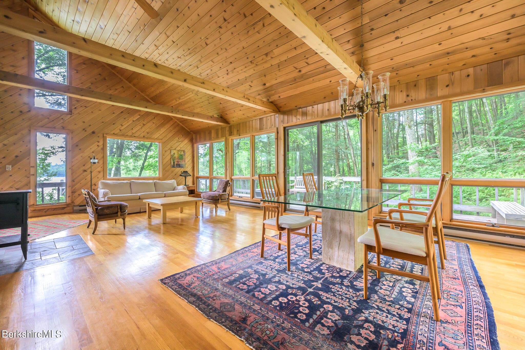 29 Lakeside Drive Tyringham, MA 01238 - Photo 5 of 31 a living room with couch and a table