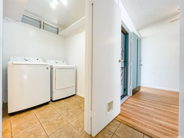 a view of utility room with washer and dryer