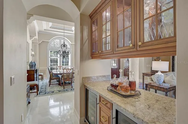 a kitchen with stainless steel appliances granite countertop a sink and a stove