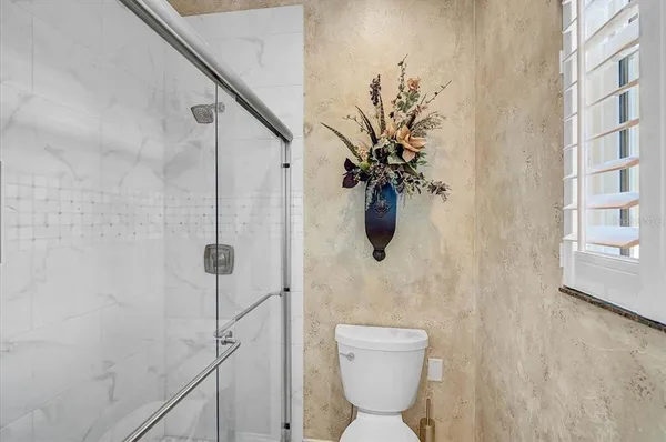 a house with palm tree in front of it