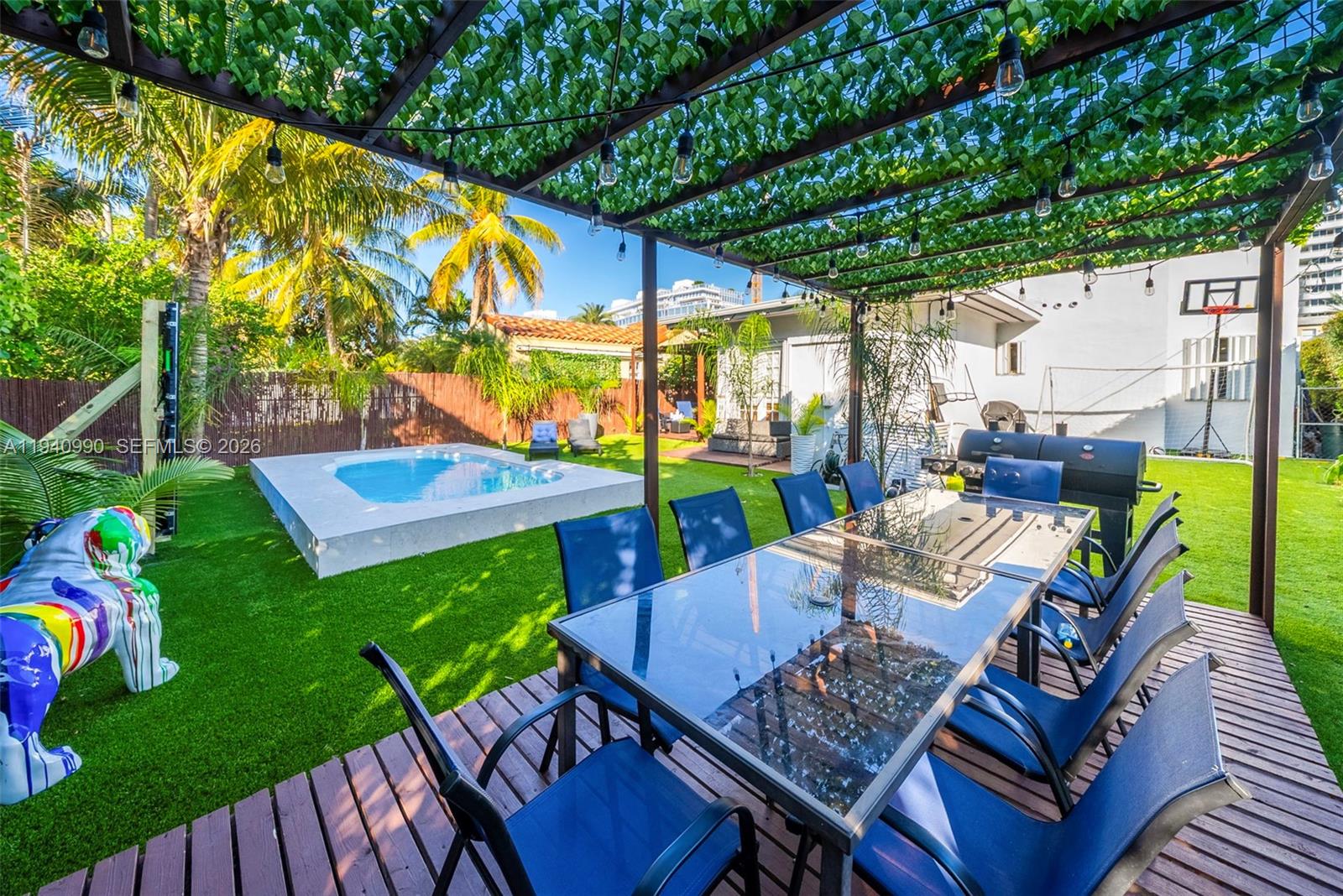8918 Harding Avenue Surfside, FL 33154 - Photo 5 of 24 a view of an outdoor sitting area with furniture