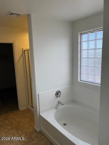 a bathroom with a bathtub