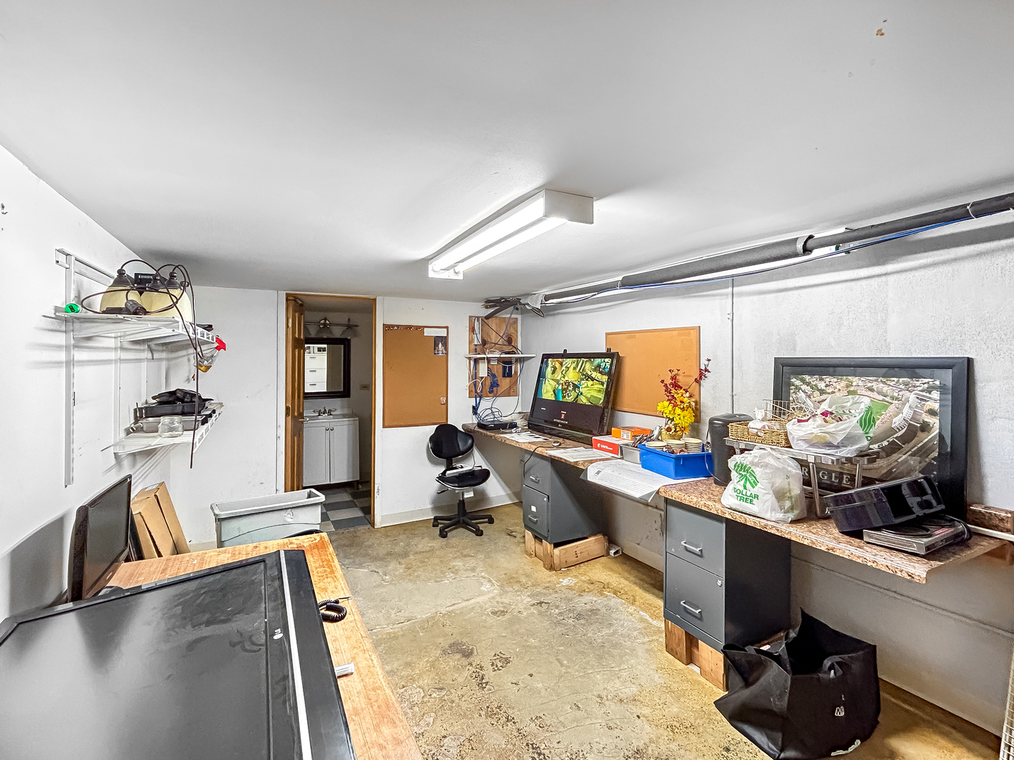5481 North Northwest Highway Chicago, IL 60630 - Photo 18 of 60 a view of a workspace with furniture window and wooden floor