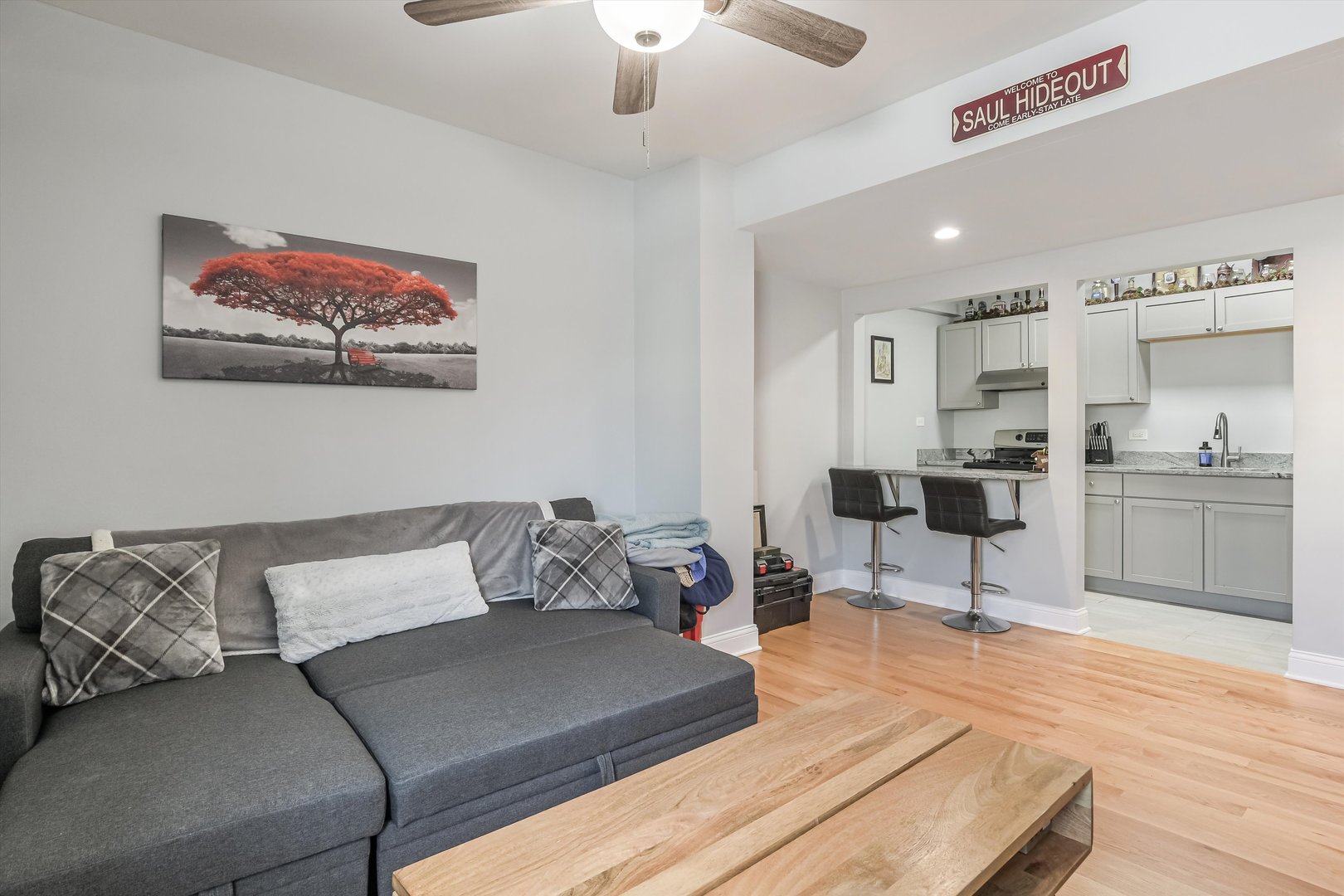 5481 North Northwest Highway Chicago, IL 60630 - Photo 21 of 60 a living room with furniture and view of kitchen