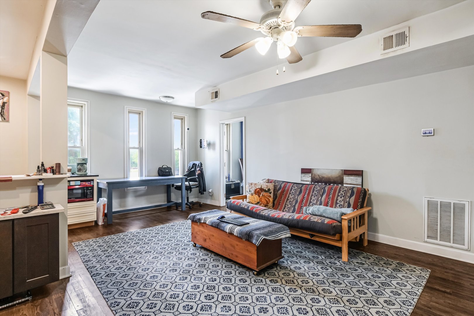 5481 North Northwest Highway Chicago, IL 60630 - Photo 29 of 60 a living room with furniture and wooden floor