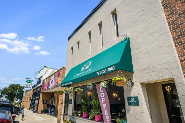 a view of a house with a street