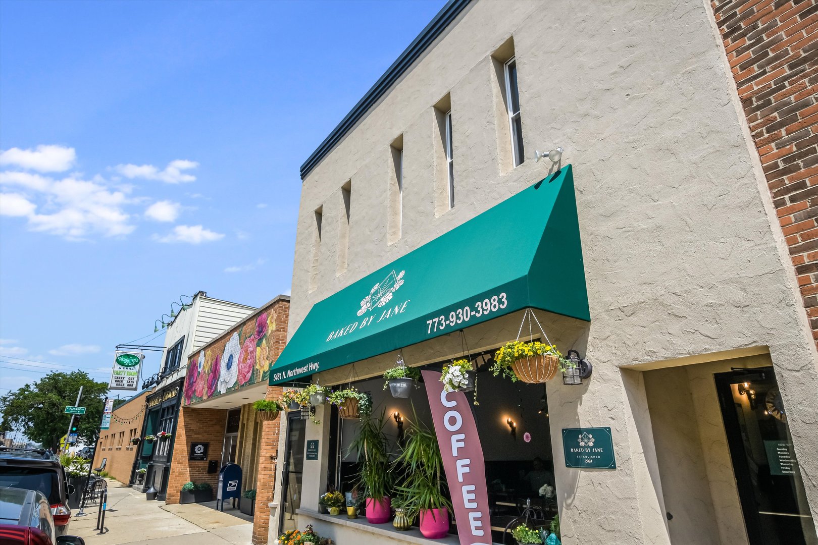 5481 North Northwest Highway Chicago, IL 60630 - Photo 3 of 60 a view of a house with a street