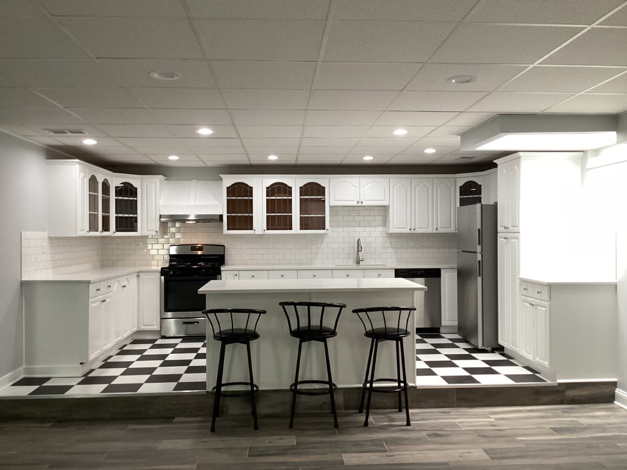 5481 North Northwest Highway Chicago, IL 60630 - Photo 35 of 60 a kitchen with a stove and cabinets