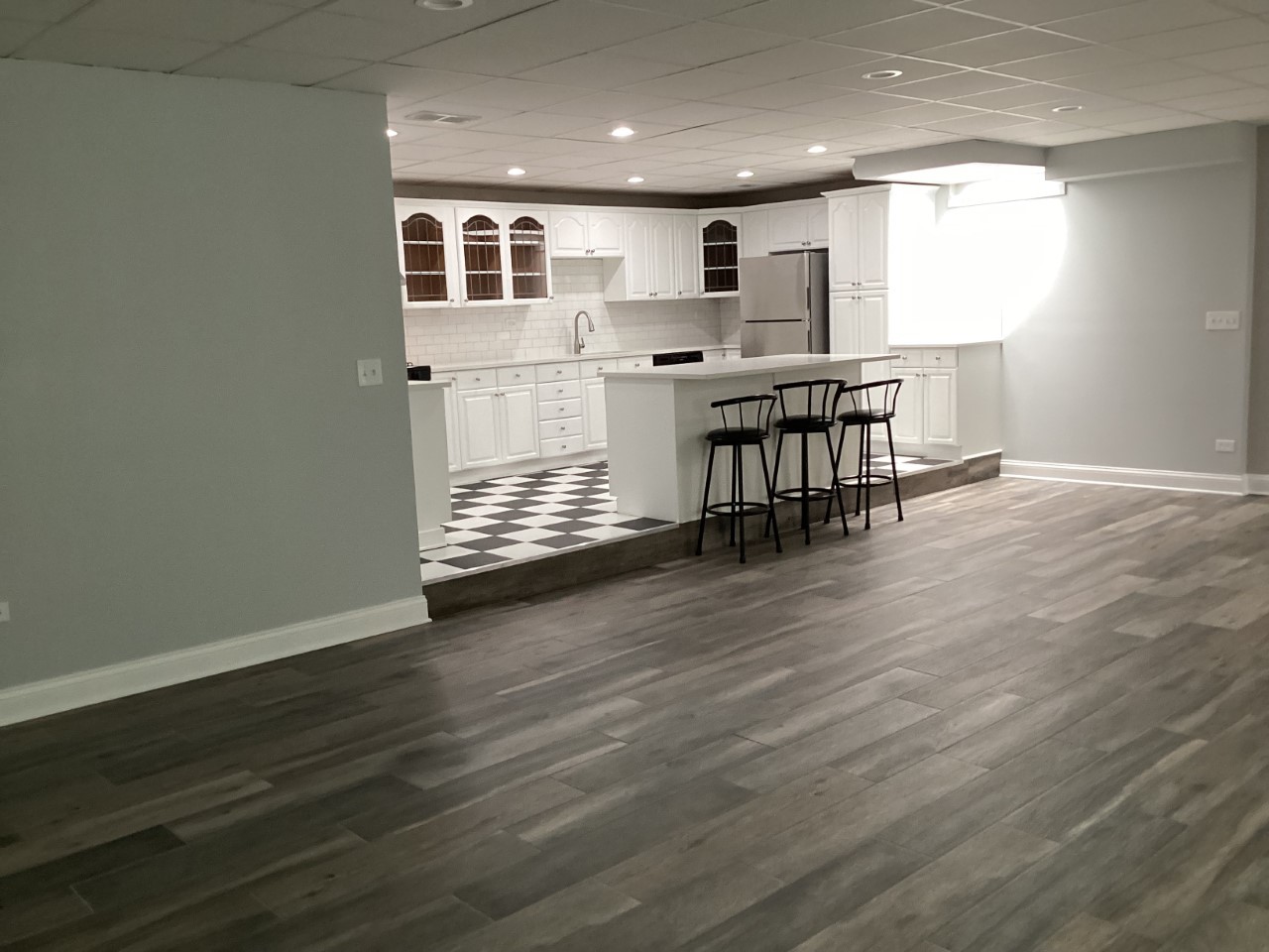 5481 North Northwest Highway Chicago, IL 60630 - Photo 36 of 60 a view of kitchen with kitchen island microwave and wooden floor
