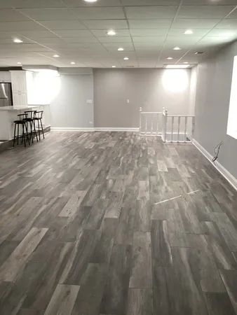 an empty room with closet and a bathroom