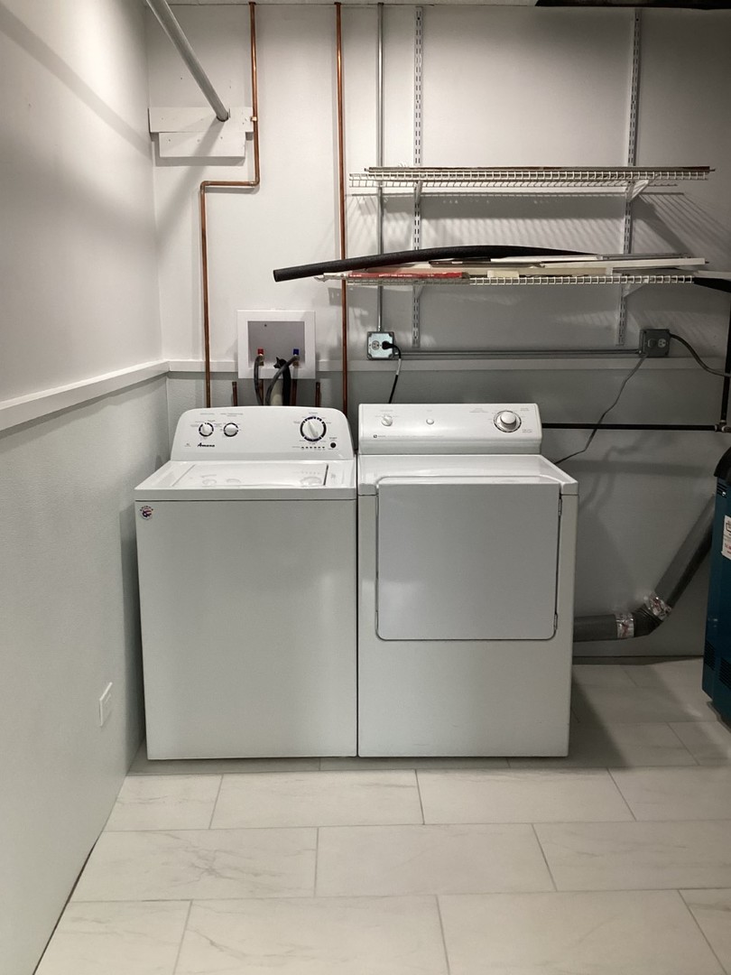 5481 North Northwest Highway Chicago, IL 60630 - Photo 47 of 60 a utility room with washer and dryer