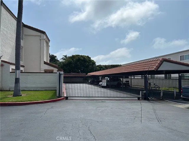 a view of car parked in front of house