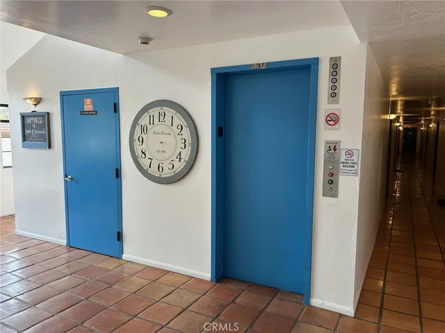 a view of a hallway with elevator