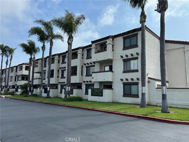 a view of a building with a street