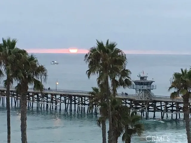 a view of a chairs and table on the terrace