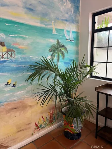 a vase of flowers sitting on a table