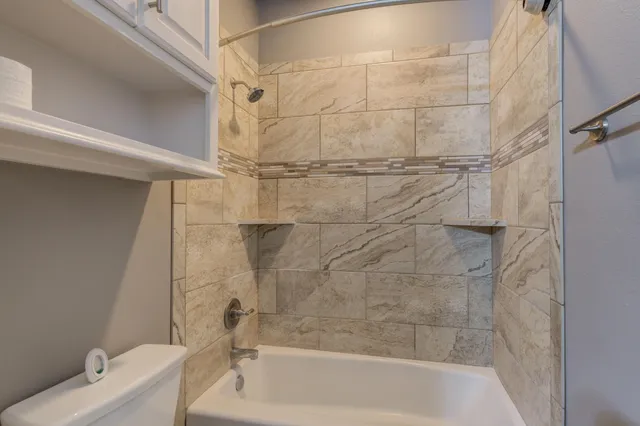 a bathroom with a bathtub