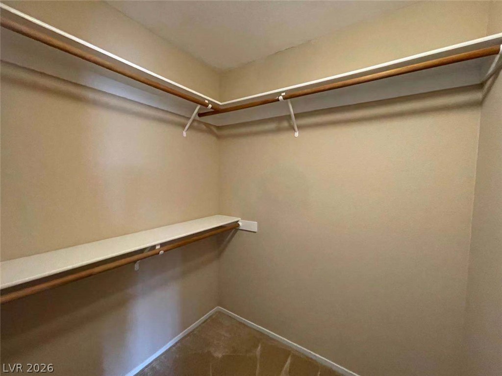 3500 Redwood Ridge Way North Las Vegas, NV 89031 - Photo 10 of 13 Functional closet space provides ample storage with integrated shelving and hanging rods.