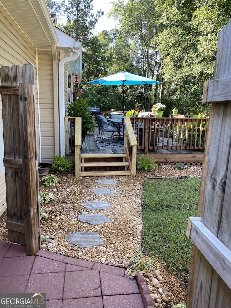 101 Cords Bridge Road Northeast Milledgeville, GA 31061 - Photo 18 of 44 a view of a house with backyard and porch