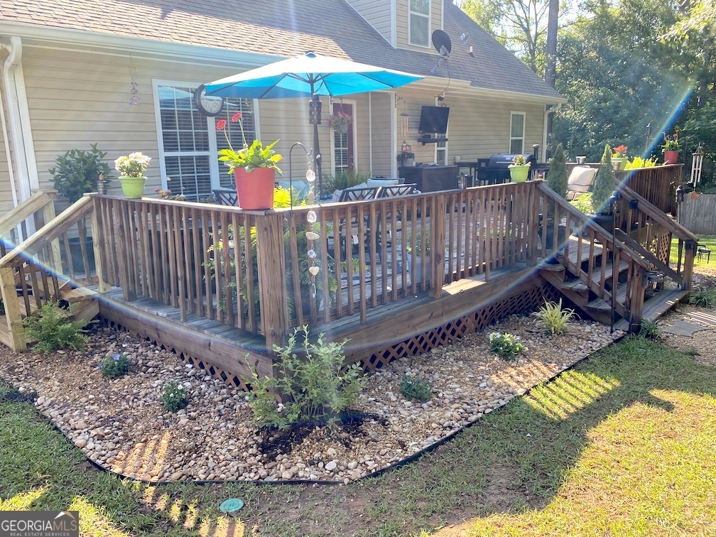 101 Cords Bridge Road Northeast Milledgeville, GA 31061 - Photo 21 of 44 a view of a roof deck with furniture