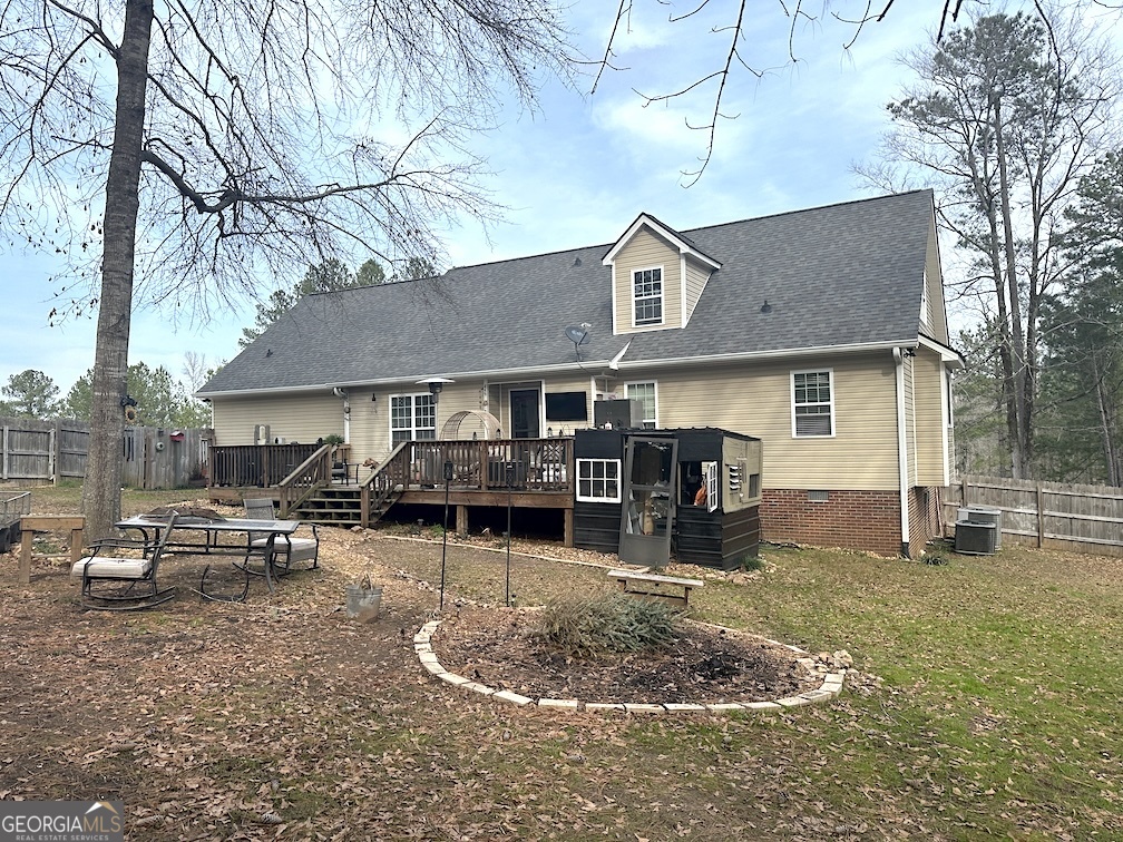 101 Cords Bridge Road Northeast Milledgeville, GA 31061 - Photo 23 of 44 a house that has a tree in front of it