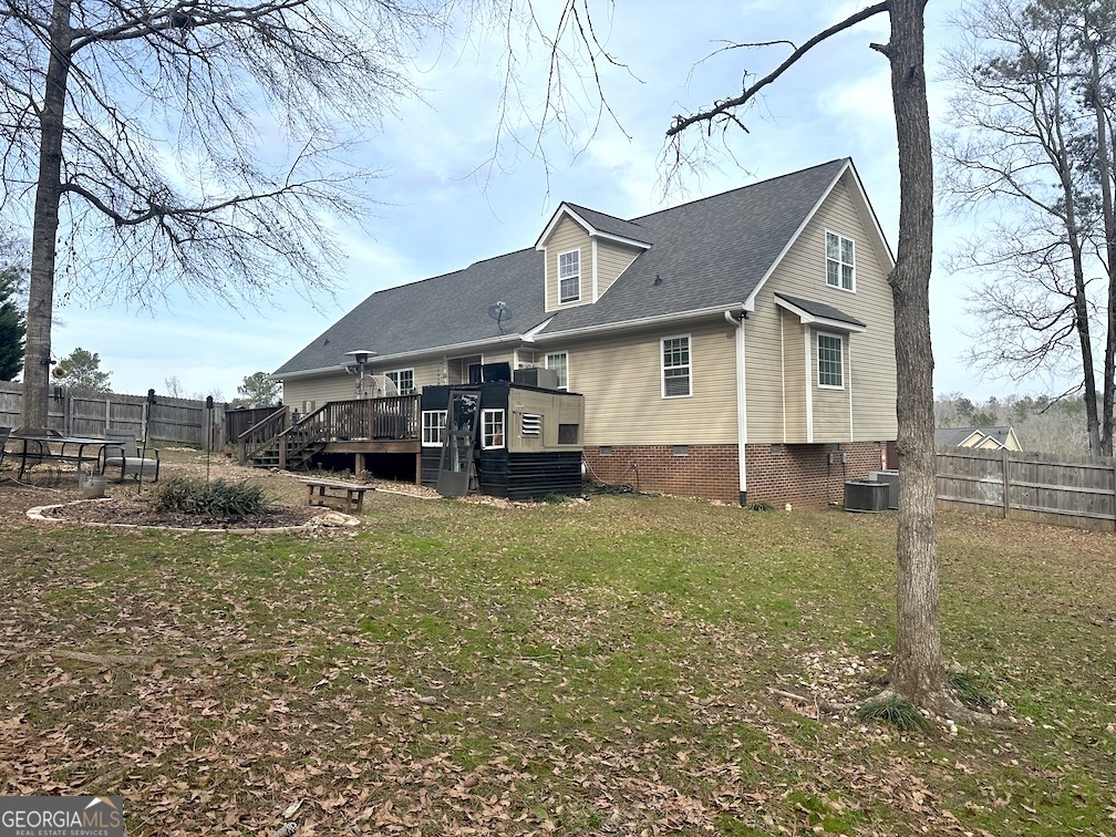 101 Cords Bridge Road Northeast Milledgeville, GA 31061 - Photo 42 of 44 a house view with a garden space