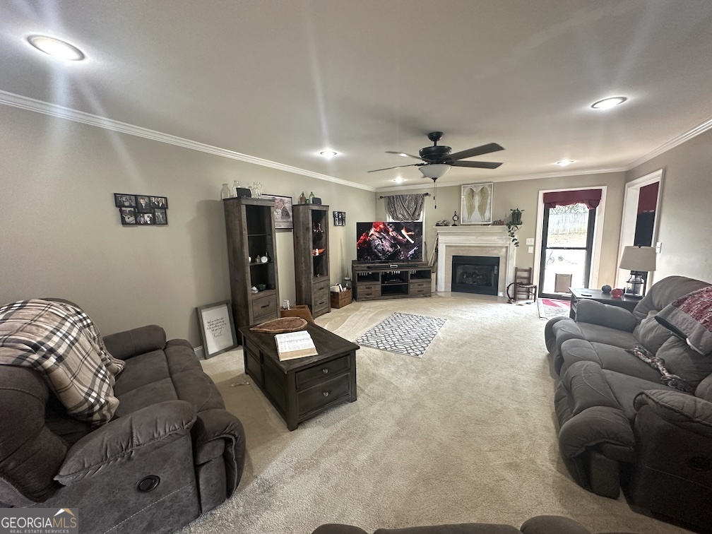 101 Cords Bridge Road Northeast Milledgeville, GA 31061 - Photo 6 of 44 a living room with furniture and a fireplace