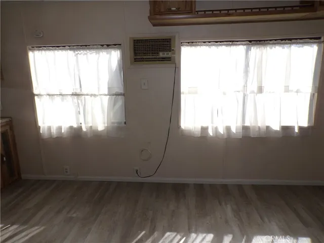 a view of a window in an empty room