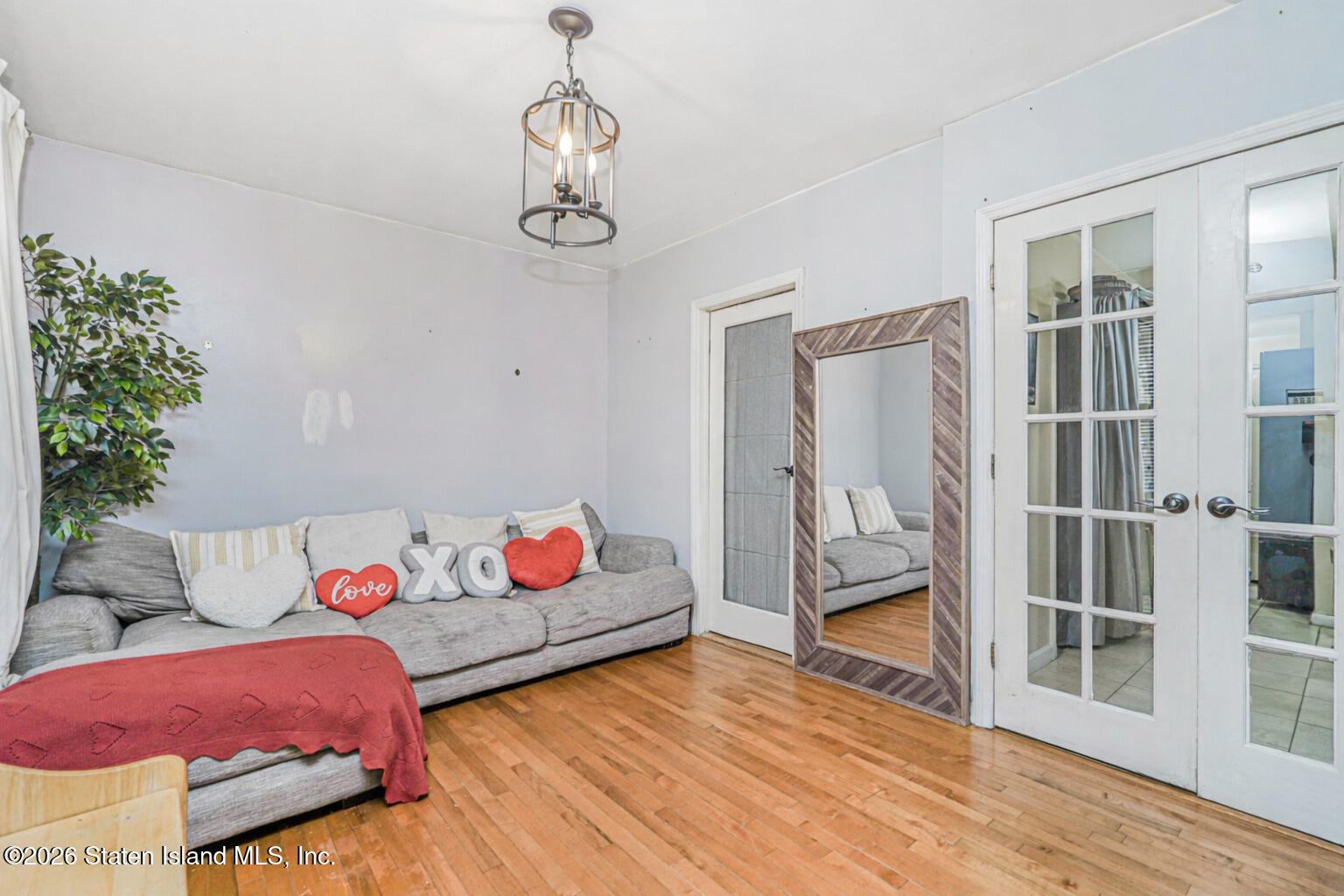 39 Post Lane Staten Island, NY 10303 - Photo 2 of 17 a bedroom with furniture and window