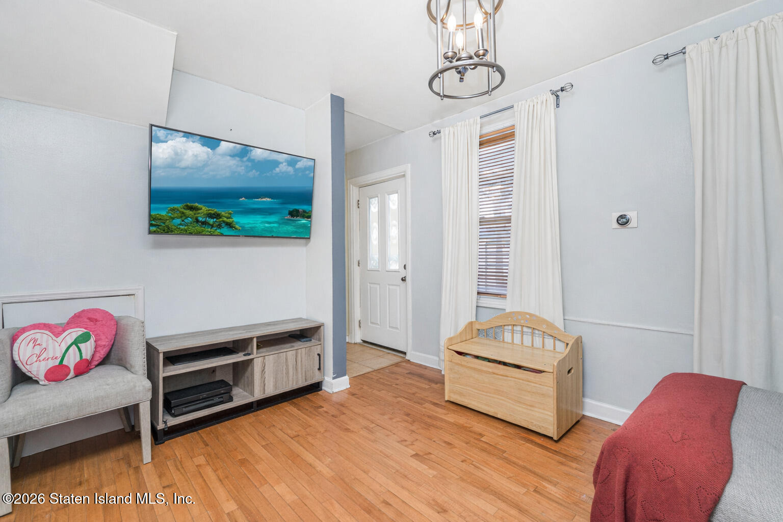 39 Post Lane Staten Island, NY 10303 - Photo 3 of 17 a bedroom with furniture and a window