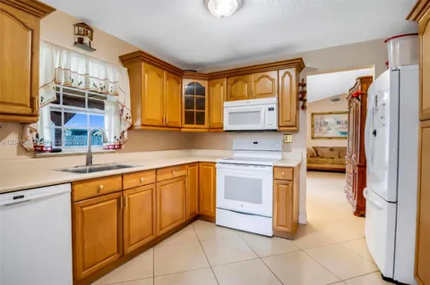 $670,000 | 19240 Northwest 60th Court, Hialeah, FL 33015