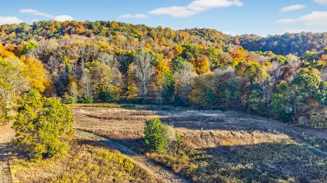 an aerial view of residential house with parking space