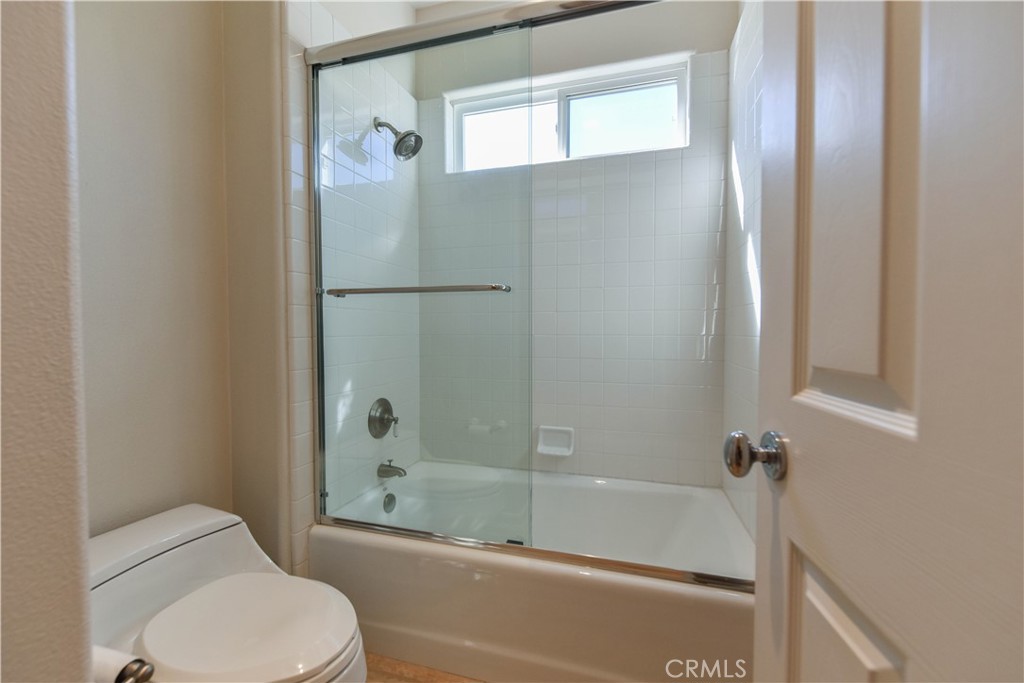 21 Marisol Newport Coast, CA 92657 - Photo 21 of 35 a bathroom with a toilet and shower