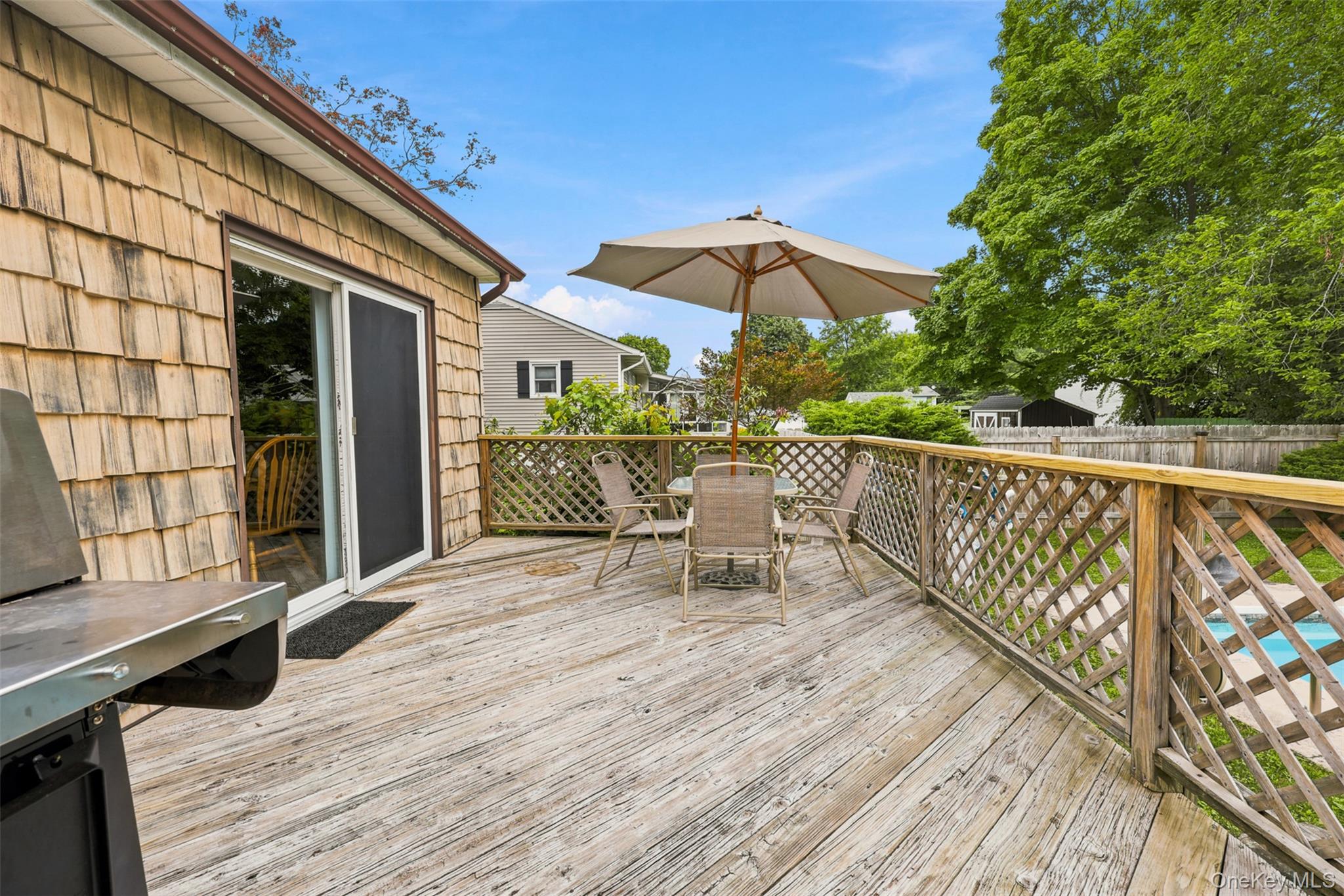 48 Ryerson Road New Hampton, NY 10958 - Photo 33 of 33 Spacious outdoor deck featuring wood flooring and lattice railing