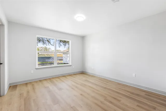 an empty room with windows